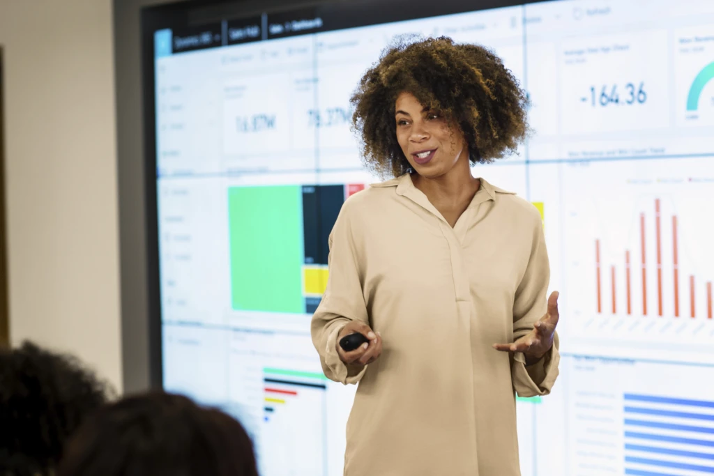 Business woman giving presentation on the Power Platform.