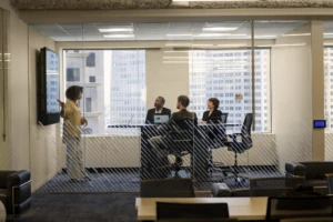 a couple of people that are standing in a room