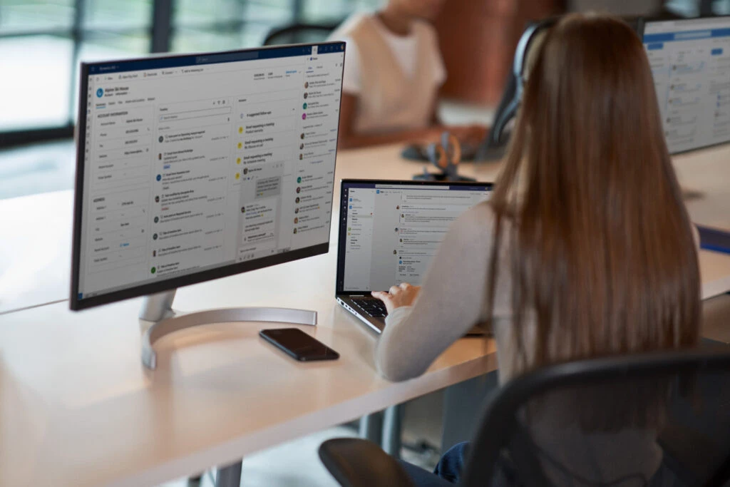 Employee using data to personalise the experience of the customer.