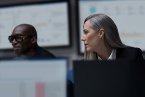 Practitioner and C I S O collaboration in a security operations center.